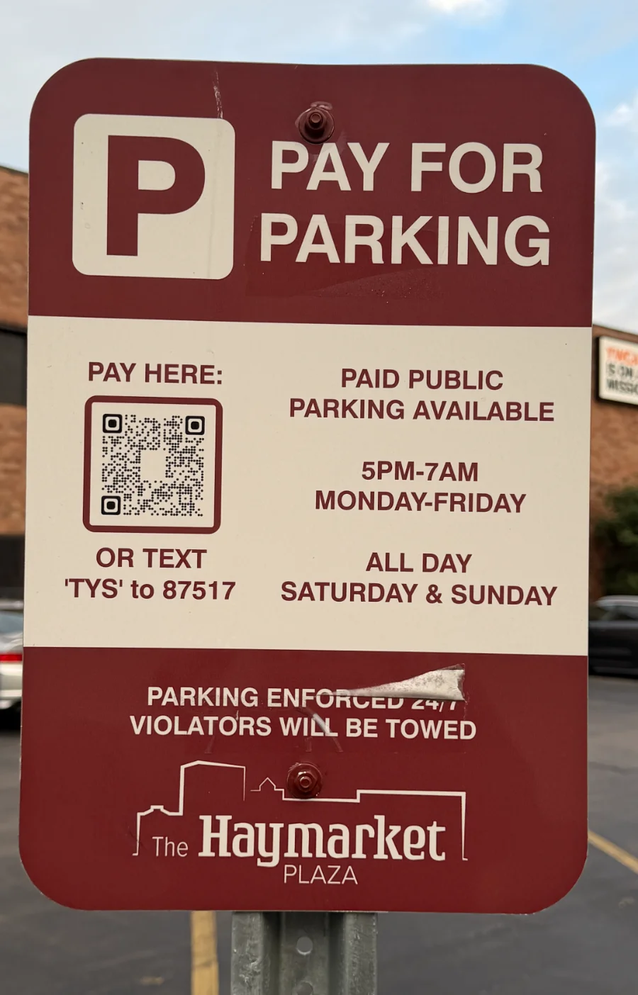 The Haymarket Plaza parking sign at 305 East Michigan Avenue